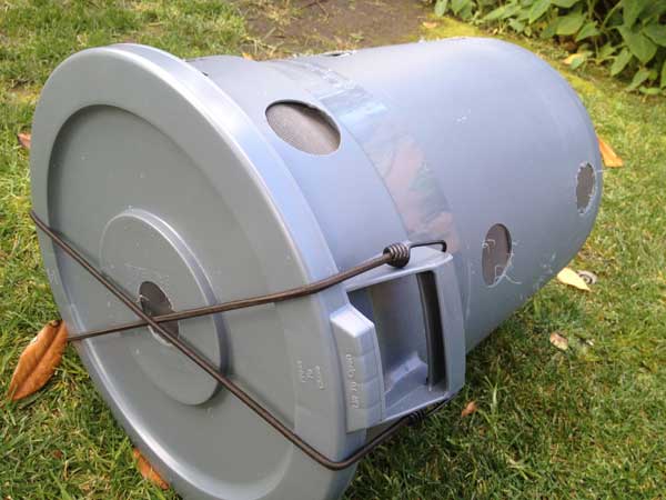 My husband made a compost bin out of a large corrugated tube and is now  creating An enclosure with siding. A hinged lid as well. We have never  composted before- mostly we