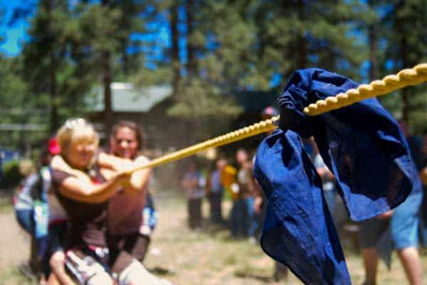 Tug of War is about as basic a game as there is. You just need a long rope and bandana or piece of cloth to mark the center. Organize your teams by family or do a boys vs. girls. Pride is on the line and tug-of-war games can get heated but remember it's all about having fun. Do a best of three to determine a true winner.