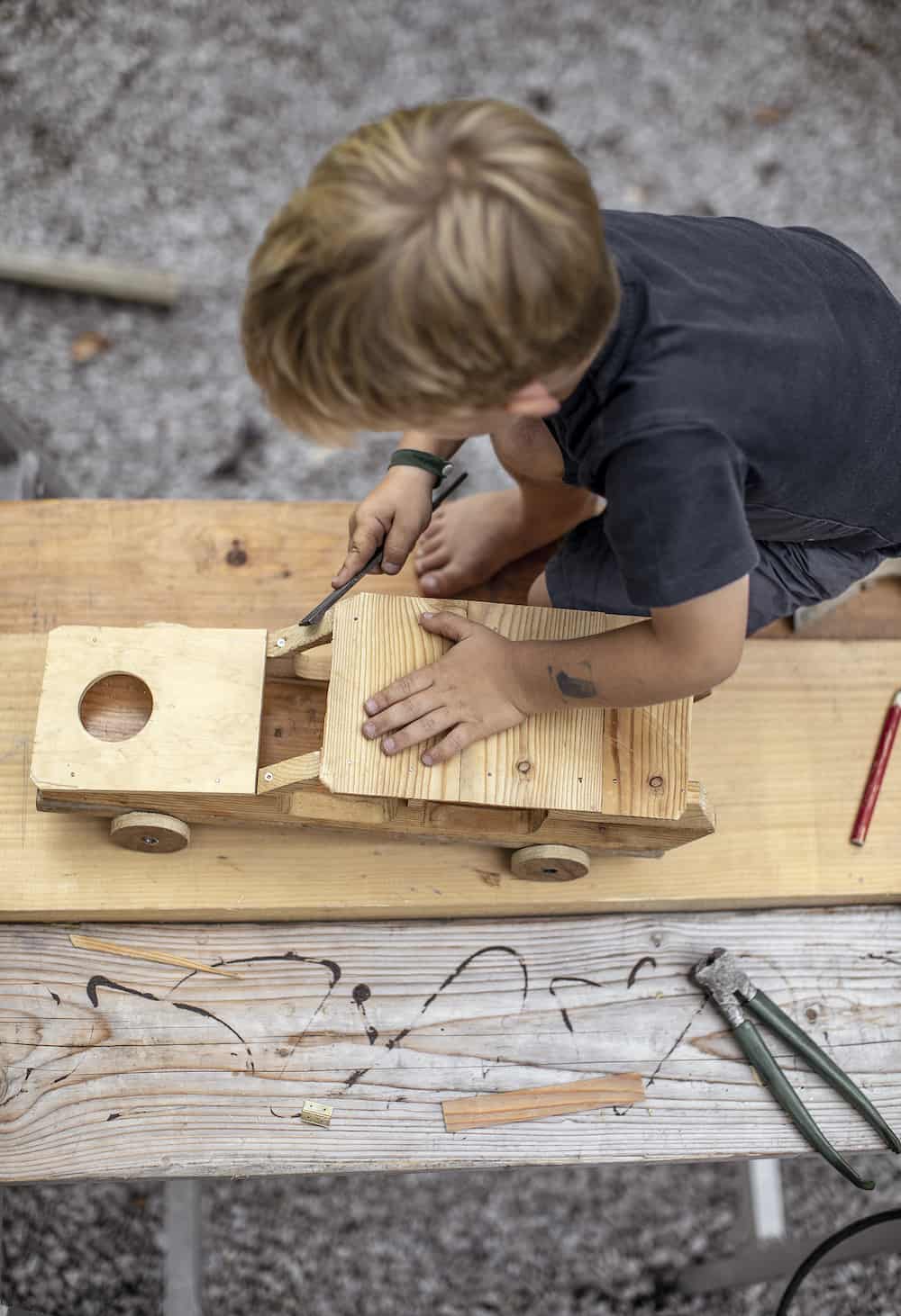 Dad builds a fantastical and functional wooden sci-fi car for kids