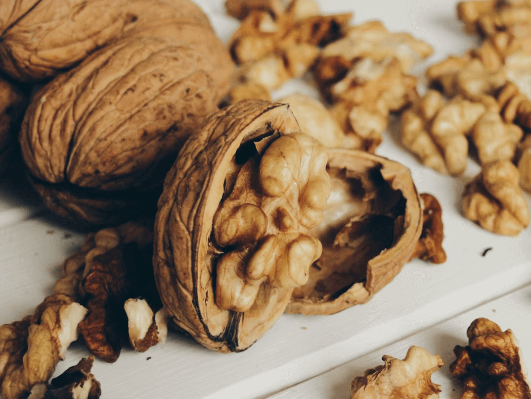 Walnuts on a table for brain health tips