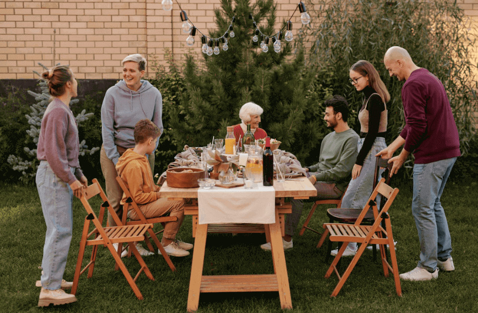 family having picnic on their lawn