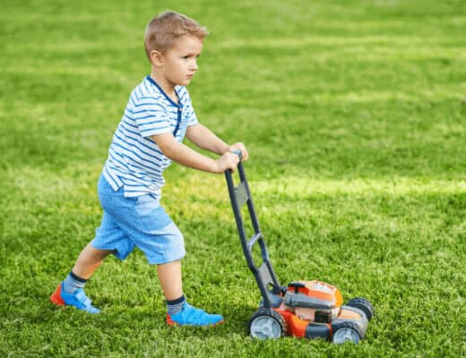 kid playing on the lawn
