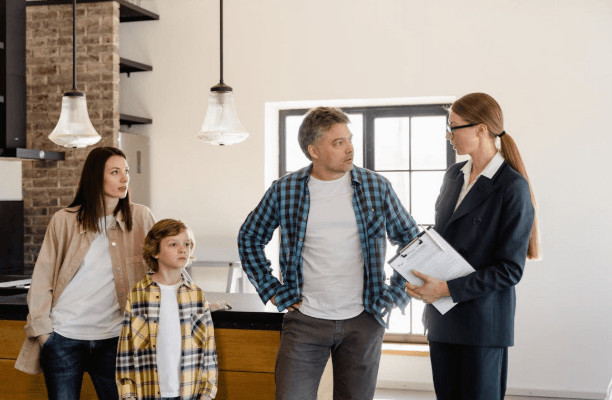 parents talking to a contractor