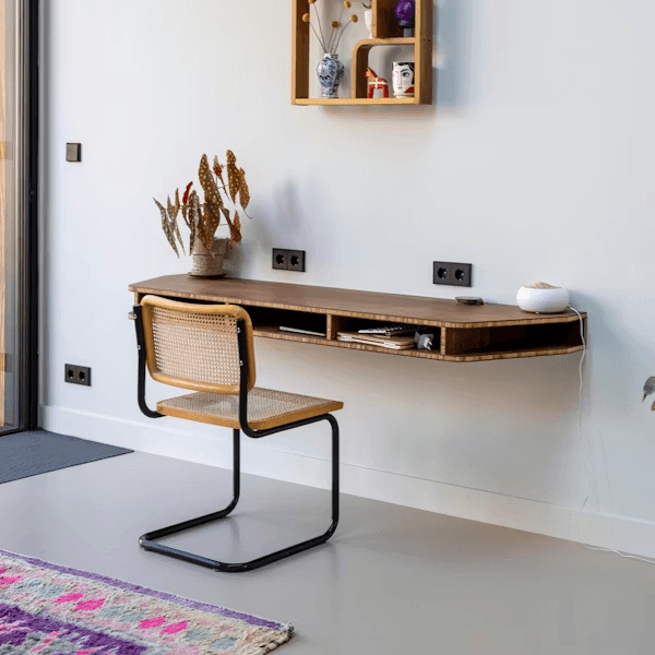 Childproofed desk with corner guards and secured shelf