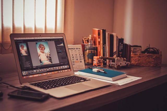 Laptop and desk in a work from