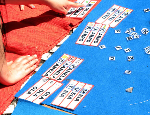 Kids arranging the alphabet puzzle