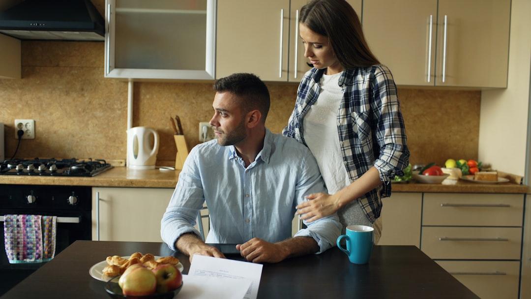 A parent organizing important family documents