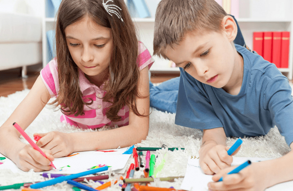 Kids creating character passports on a white