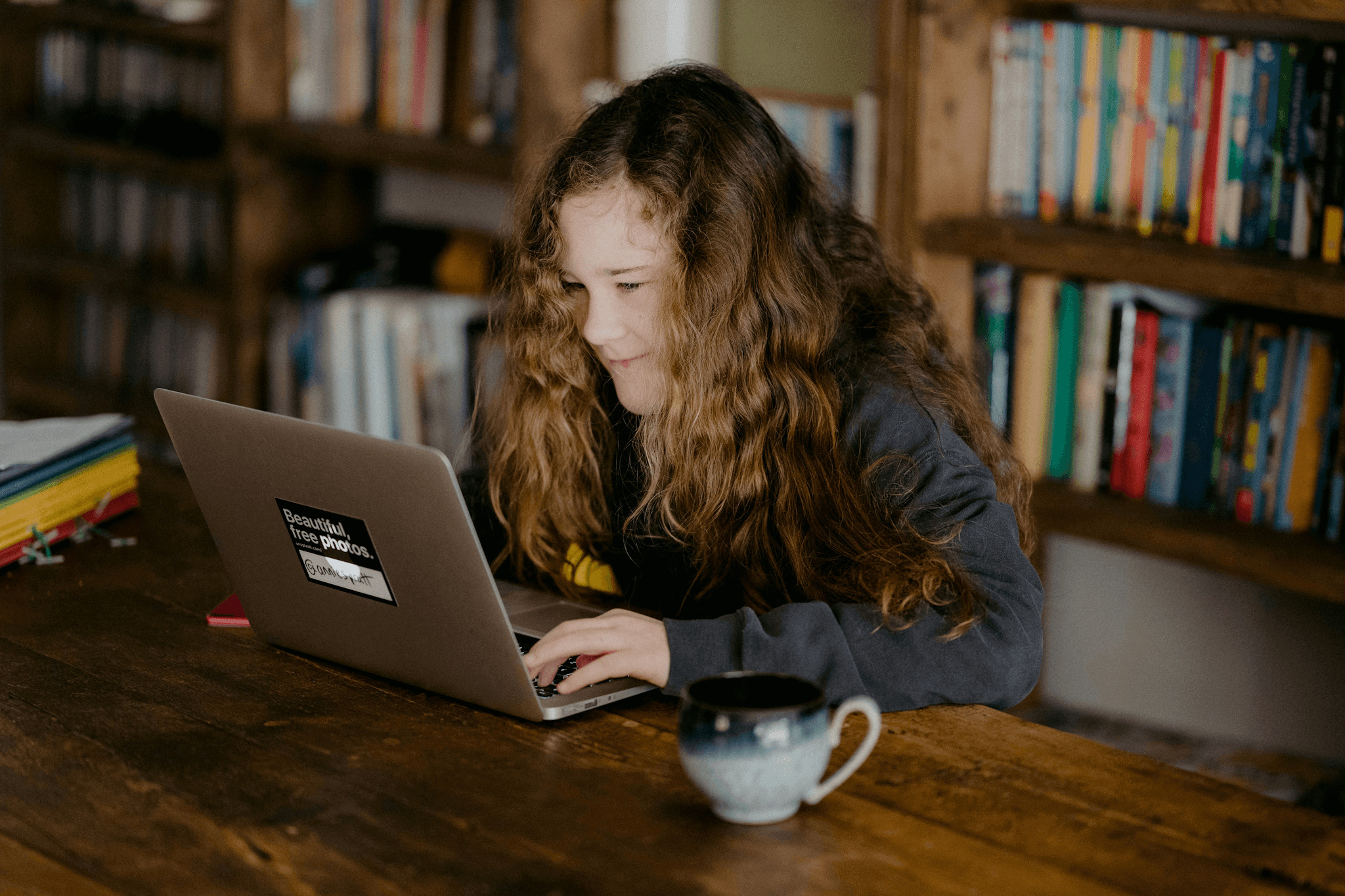 Girl using a back-to-school laptop