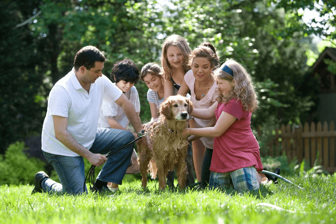 Family enjoying time together with their dog in a