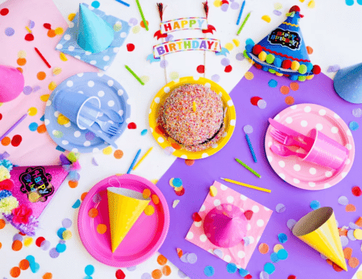 Colorful party supplies on a table for a child'