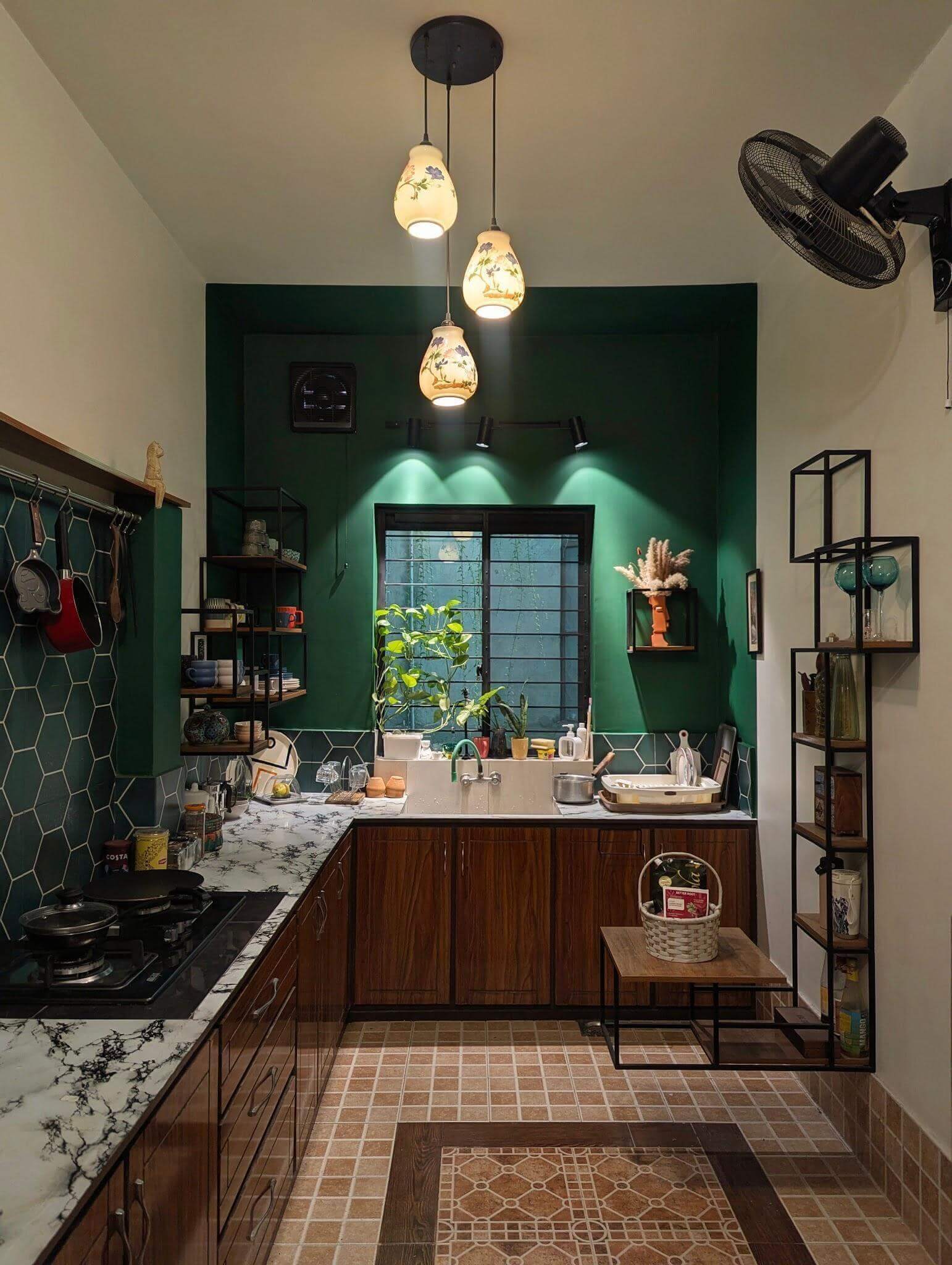 Kid-friendly kitchen with green walls and tiled flooring