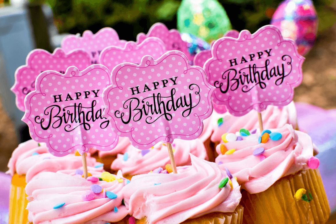 Pink frosted cupcakes for a child