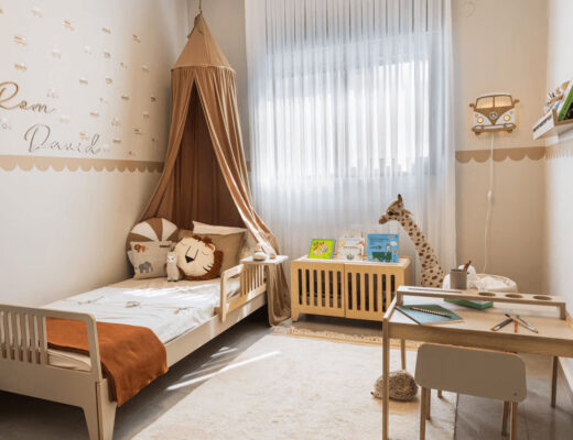 Stylish child's bedroom with bed, desk,