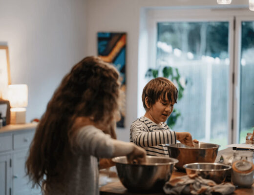 Woman and child preparing food in a kid-friendly